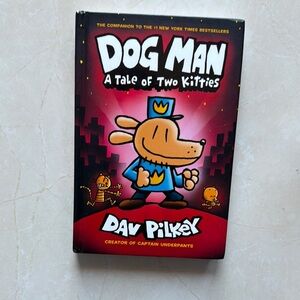 Dog Man: A Tale of Two Kitties by - Red and Black Cover